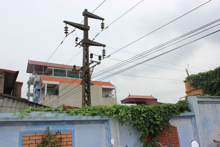 Quy định bồi thường khi có đường dây điện của tư nhân đi qua đất